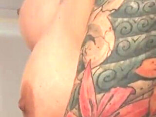 Tattooed big boobs loves the cock in pussy in mouth in the bathroom