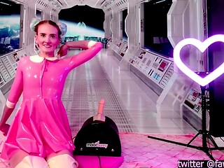 Petite girl in pink latex dress gets intense vibrator orgasm