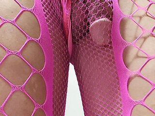 Milah shows off her pink fishnet tail