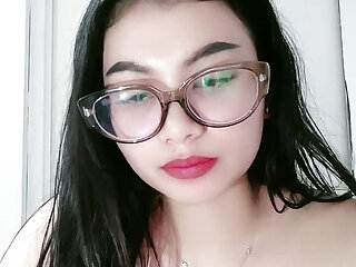 Woman wearing cleavage glasses