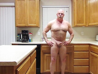 Naked on foot in the kitchen