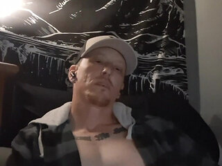 Muscular guy moans as he cums hard all over