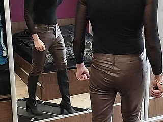 Learning to walk in heels in leather pants