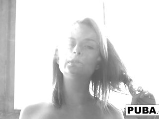 Busty Ashlee Graham smokes while showing off her natural