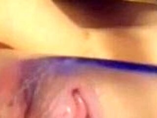 Cam girl masturbates close up using her fingers and toy