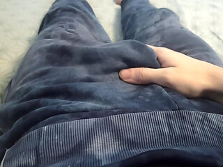 Guy in pants is massaging his cock