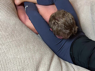 Cruel Headscissors in Blue Leggings on the Couch