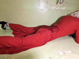 In the shower in a long red dress