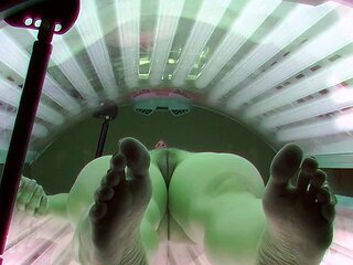 Hairy MILF in solarium