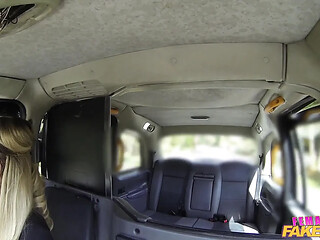 Blonde cab driver gives a hot and deep blowjob to a lucky passenger.