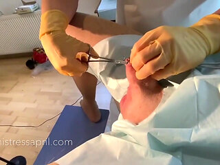 Dominatrix mistress April - clinical cock sewing