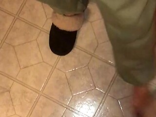 Married wife takes her husband's cock in her hands and sucks it off