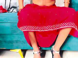 Dressed in a Full Indian Red Outfit and High Heels