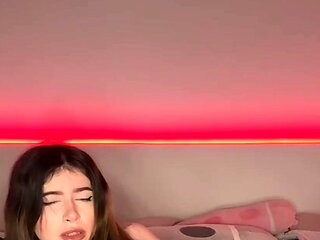 Sexy dame with enormous knockers and glasses wanking with