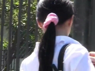 Two adorable girls fucked on the bench