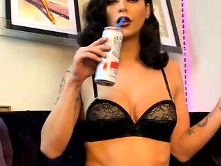 Busty babe playing with her big boobs