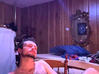 Tattoo stud playing with his cock