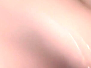 Melissa Lauren Looks Into the Camera as She Licks and Sucks a Black Dick