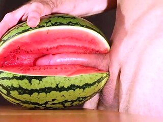 Muscular Stud Fucks and Cums on Watermelon