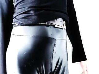 Crossdresser shakes his ass on webcam and dance hot in skin tight Latex Leggings with small cock
