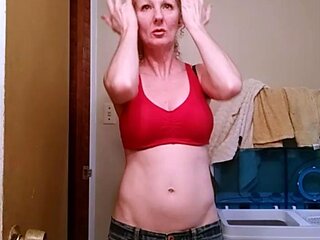 Redheaded amateur MILF with a sex toy on webcam show