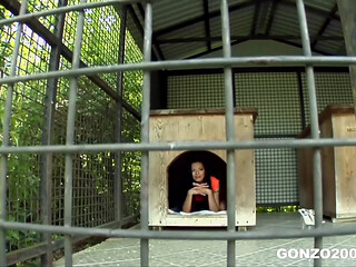 Mugur Mows the Lawn in Maid Outfit while Shalina is Locked in a Cage at Gonzo2000