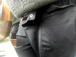 Cock slowly pops out of trousers as he adjusts his pants, revealing a soft