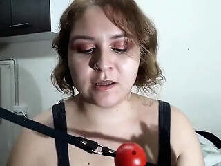 Ball-gagged and drooling South American beauty in bondage