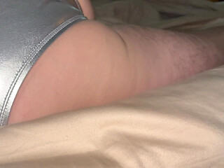 Shiny silver bikini bottom in bed