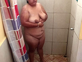Taking a shower in a public restroom.