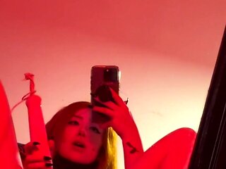 Tattooed redhead has intense orgasm with vibrator