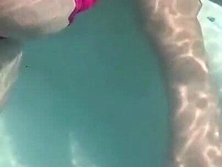 Artemisia Love Sexy and Horny Underwater Showing Her Big Tits in a Super Micro Bikini and You Can See Her Aureolas