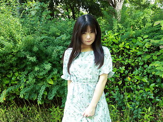 Ringo Fujii acting adorable while posing in the woods