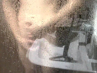 Boy takes a shower, jerks off and cums