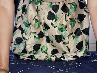 Cum wearing satin set of tank top and skirt