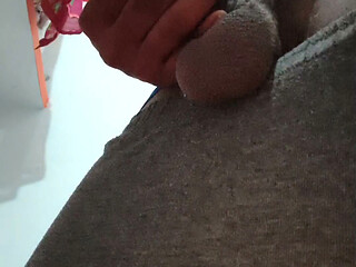 Yua caresses the boy's penis, making it thicker and longer