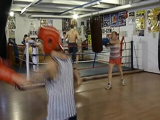 German boxer babe gets her ass fucked by two dudes
