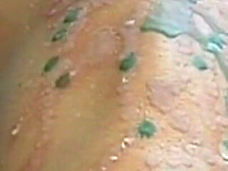 Mature MILF Enjoys Hot Wax Dripping Across Her Ass