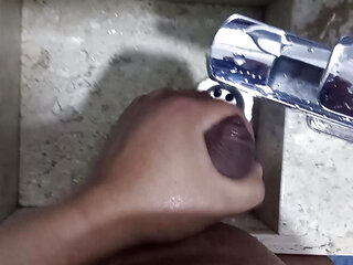 I jerk off in the hotel bathroom sink.