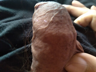 The boy masturbates his cock until it becomes tremendously thick