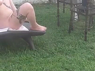 I Recorded My Stepsister Sunbathing Naked and Masturbating in the Garden