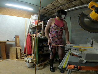 Giant fake tits crossdresser working in the wood shop