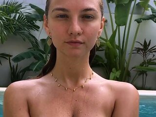 Busty curly brunette with big boobs fucks on couch