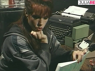 Lesbo lovers kiss each other on top of the table