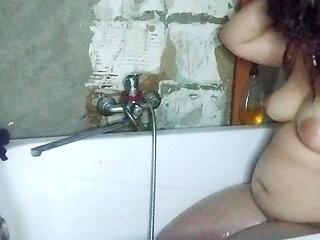 Camera in the Bathroom and a Girl with a Big Ass Is Peeing, Very Sexy