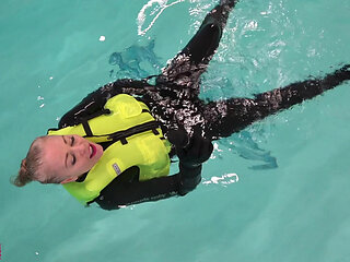 Neoprene Lust: Inflatable Snorkel Vest Pleasure in the Pool