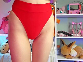 Redhead in tiny bikini tries on lingerie and shows off her tiny shaved pussy