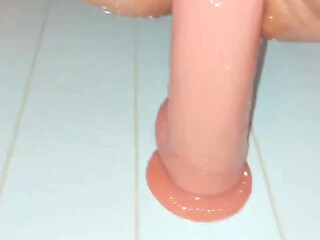 Big Dildo in Shower Streches Tiny Pussy