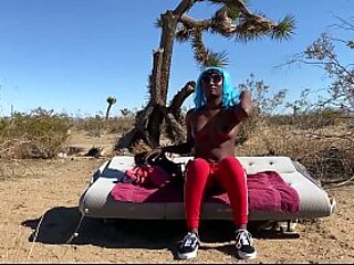 Ebony Marge sucks dick in public with oil all over her body