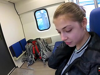 Petite brunette takes a public train ride